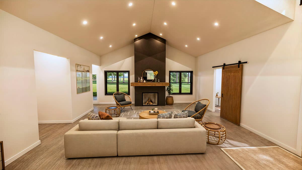 Spacious living room with a modern design, a fireplace as a focal point, and neutral tones. There are comfortable armchairs and a large sofa.