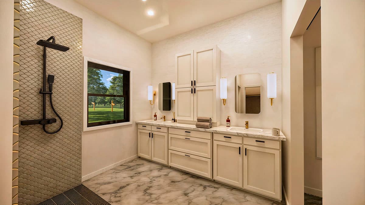 Modern bathroom with marble flooring, double vanity, and a walk-in shower. A large window offers a view of a lush green lawn, enhancing the space.