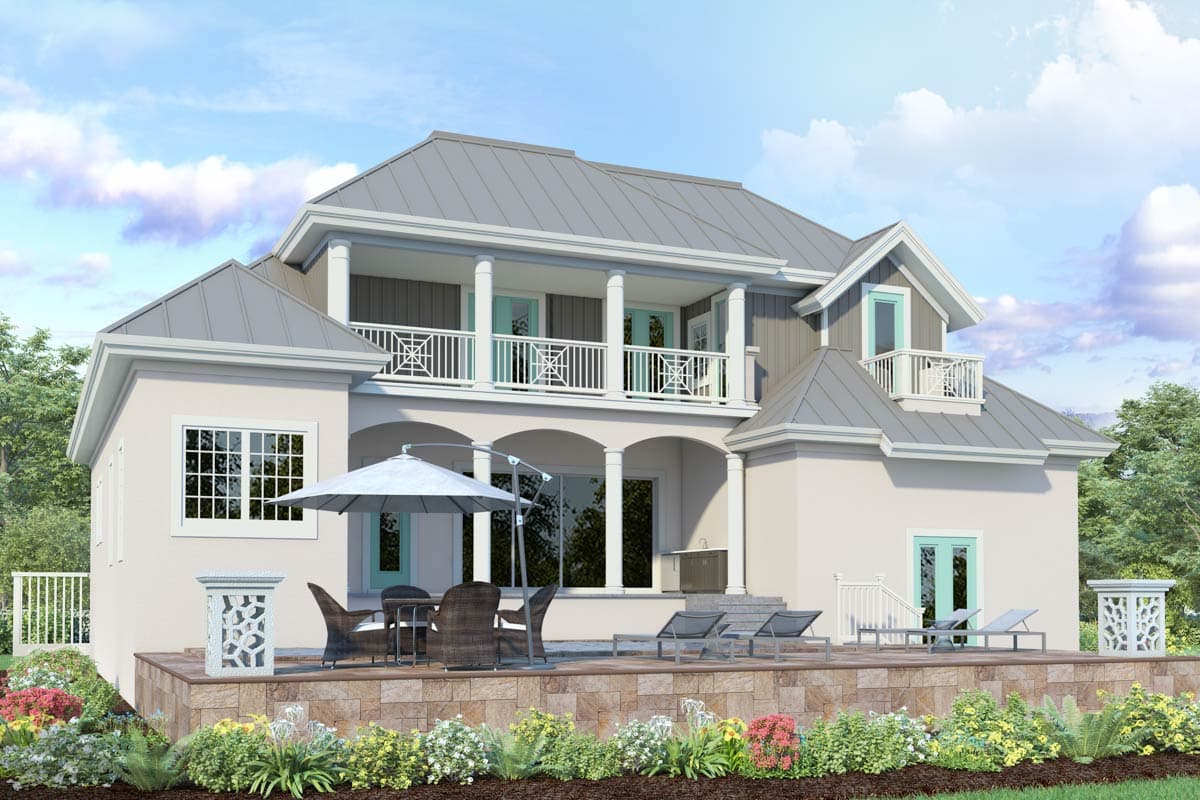 House plan exterior: two-story home with hip roofs, arched loggia, upper balcony with decorative railings, and multiple gables.