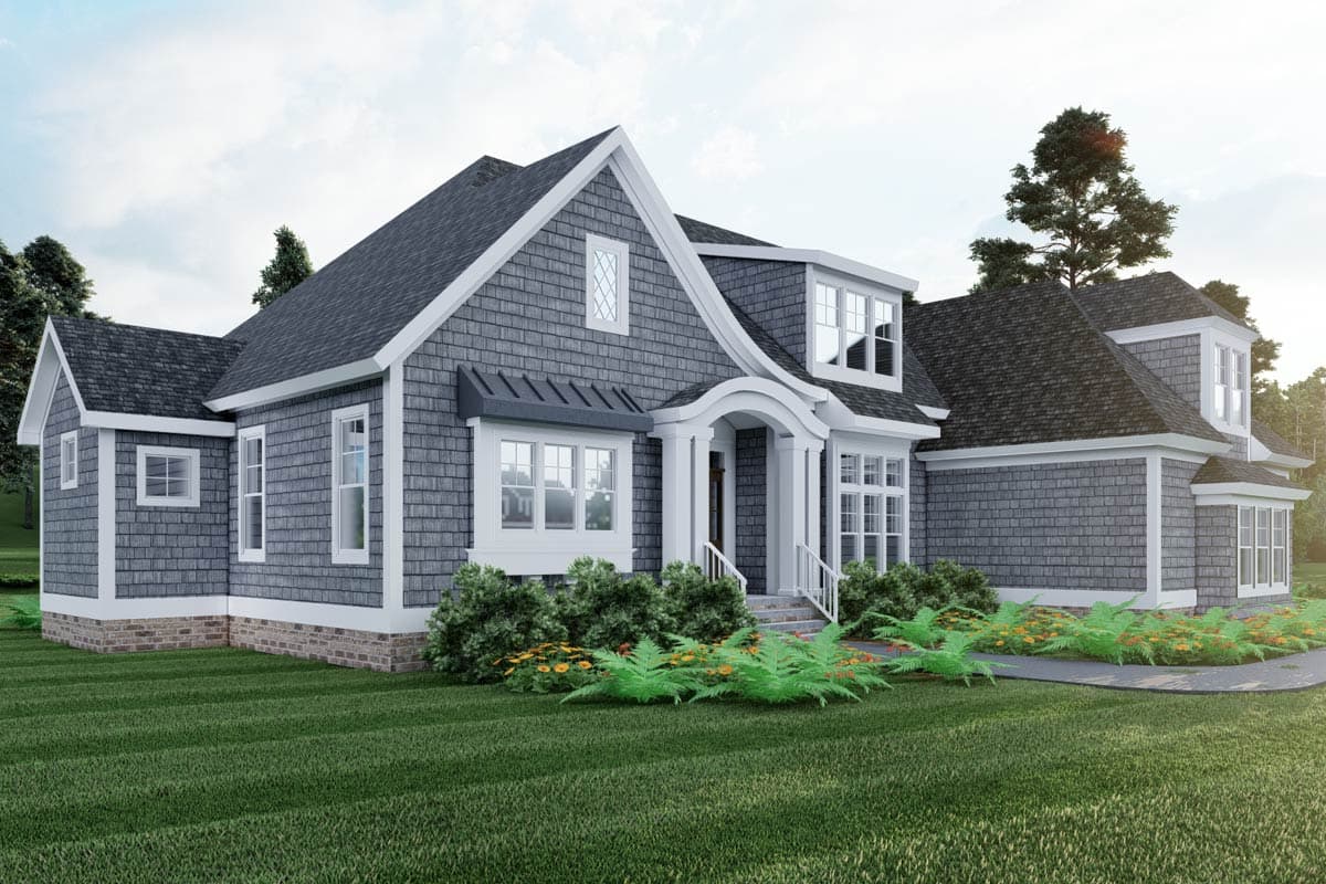 House plan exterior, Traditional style, one story, features shake siding, multiple gables, dormers, and covered entry.