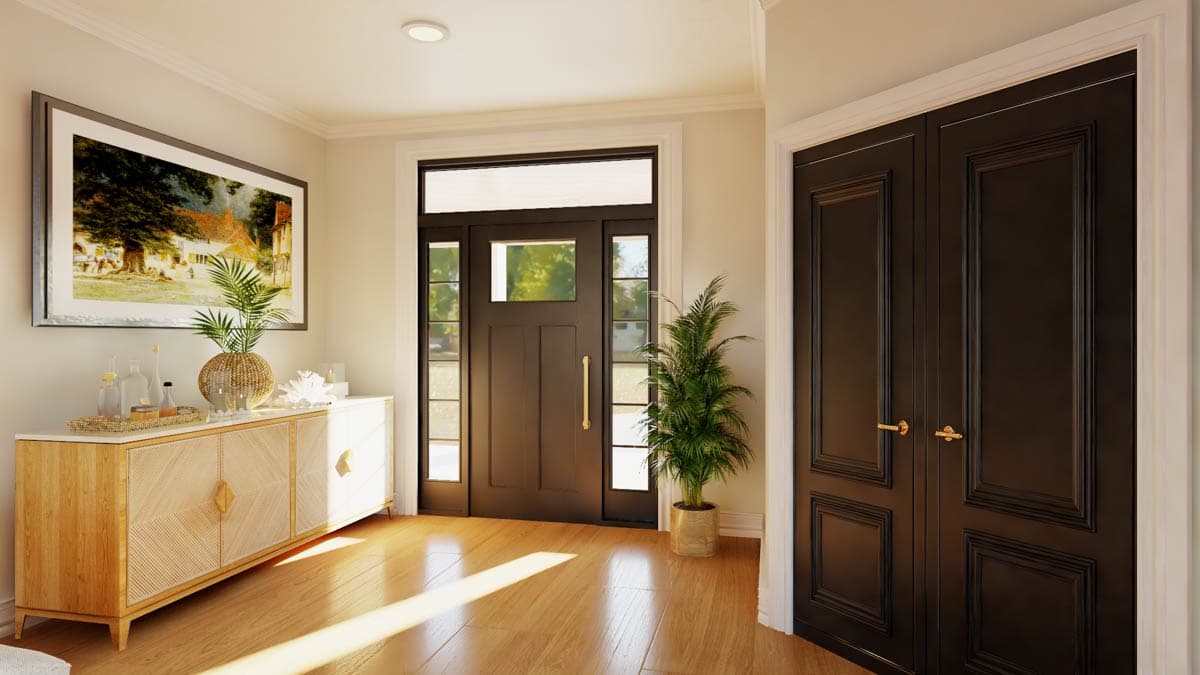 Entryway with dark paneled double doors, a dark paneled front door with sidelights and transom, and a light wood sideboard.