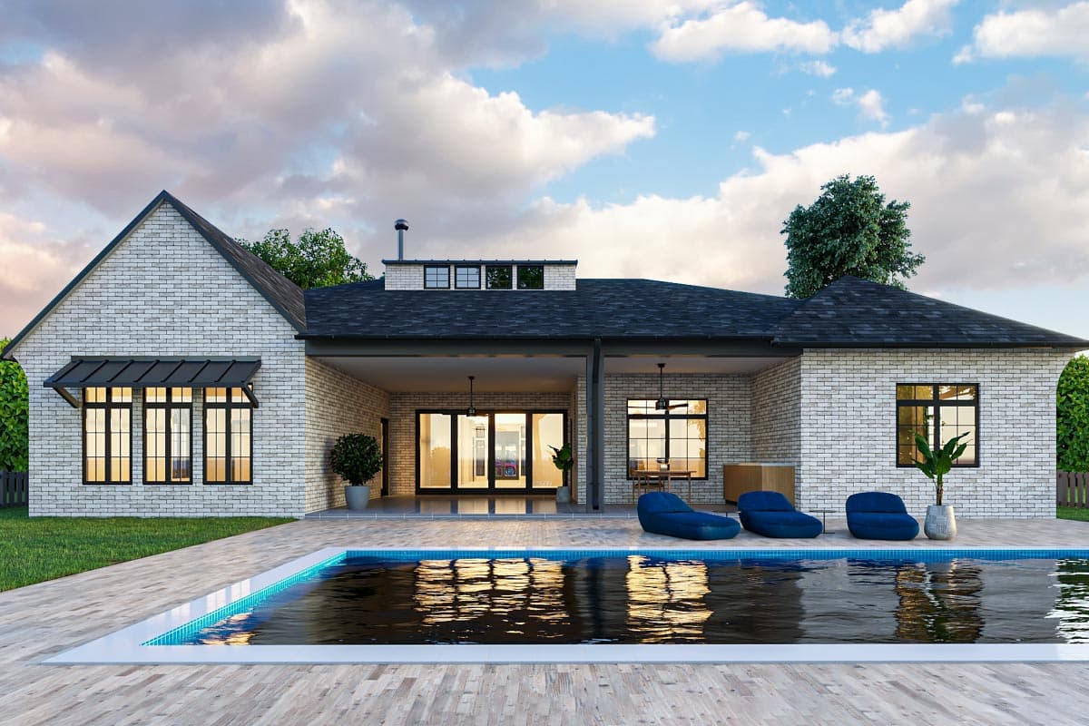 House plan exterior: single-story modern home with white brick, gabled roof, covered patio, and large windows.