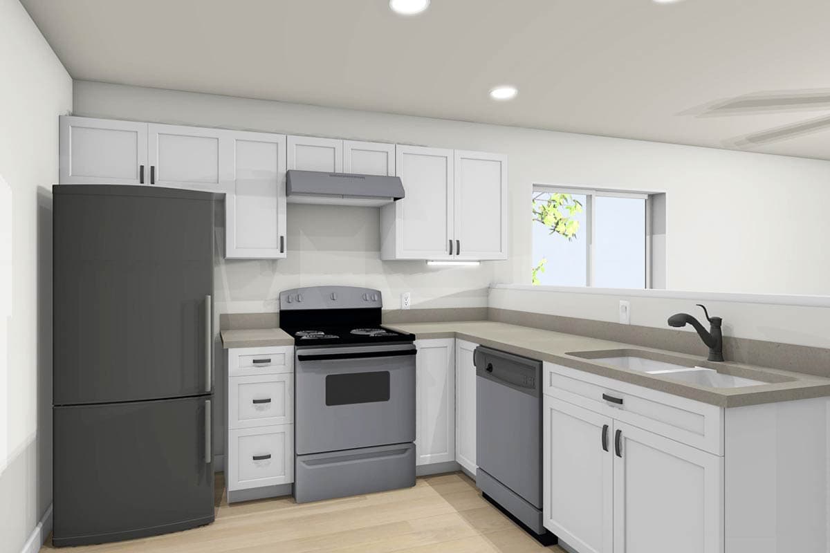 Modern kitchen with white cabinets, a gray stove and refrigerator. A sink, dishwasher, and a window complete the minimalist design.