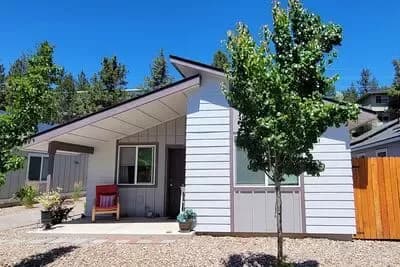 Efficient 2-Bedroom Cottage Plan with Open Concept Floor Plan - 834 Sq Ft