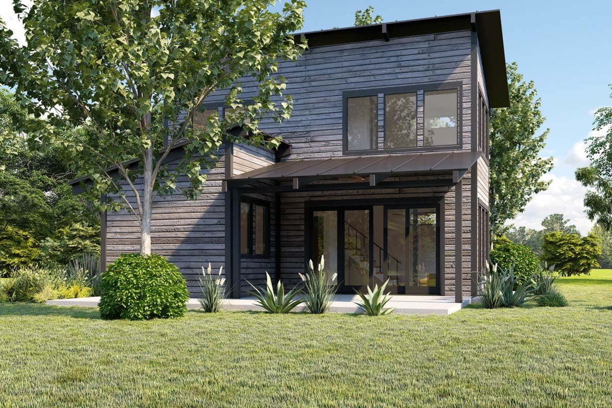 Modern house plan exterior, two stories, horizontal siding, shed roof, metal awning over sliding glass doors.