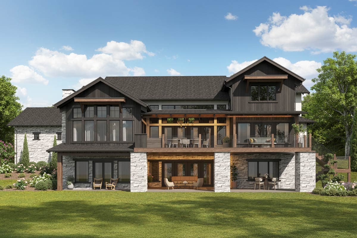 Modern house plan exterior with dark wood siding, stone accents, multiple levels, balconies, and covered patio.
