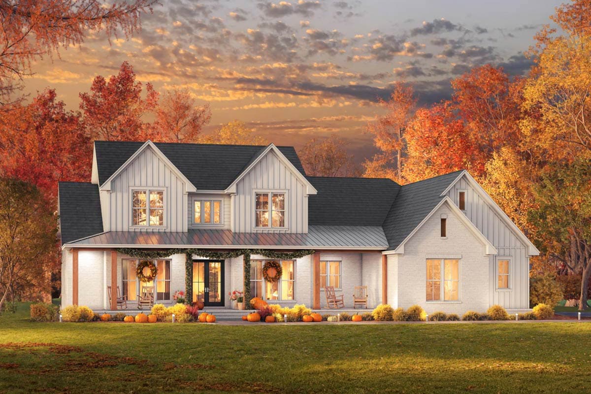 Modern Farmhouse house plan exterior with white brick, metal roof, gables, and a covered front porch with wooden columns.