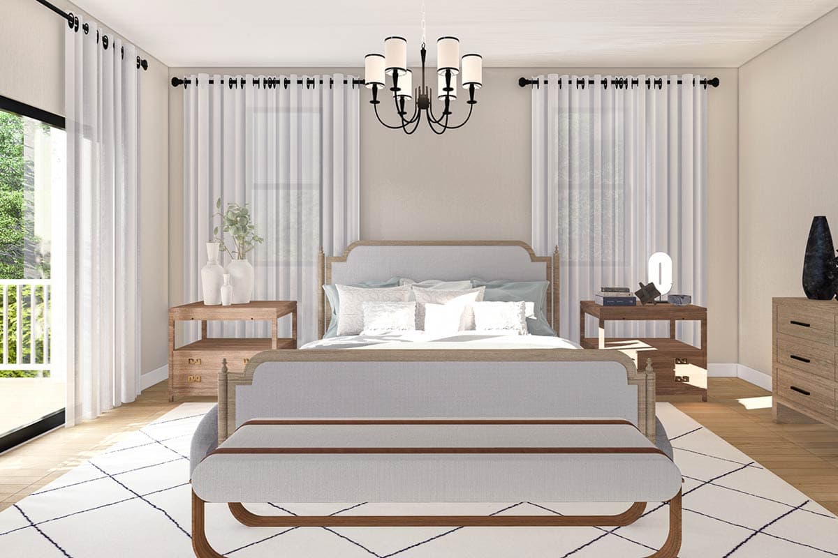 Primary bedroom with upholstered headboard, two nightstands, dresser, bench, chandelier, and balcony access.