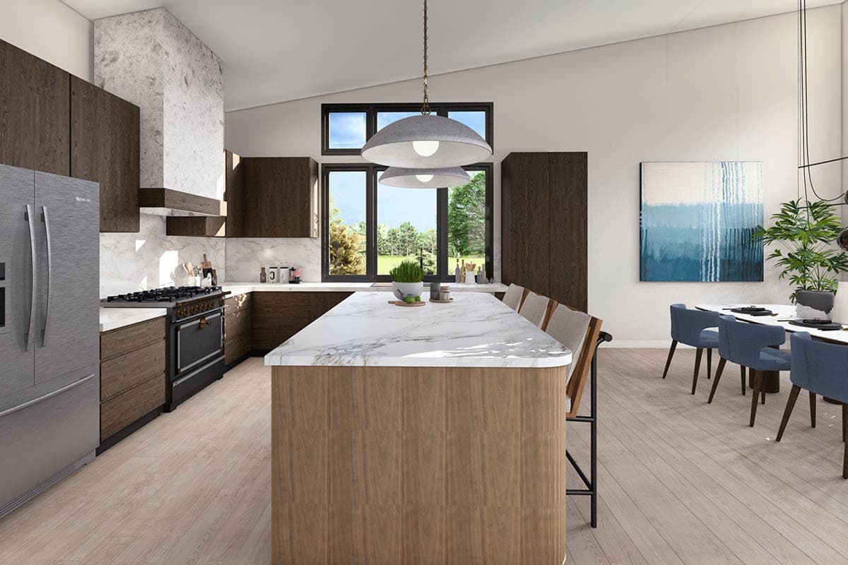 Modern kitchen with a large island, dark wood cabinets, marble countertops, and a vaulted ceiling with pendant lights.
