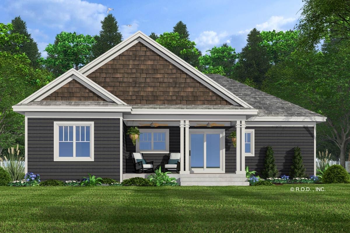 House plan exterior: Single-story, dark-sided home with shingled gable, covered porch with columns, and multiple windows.