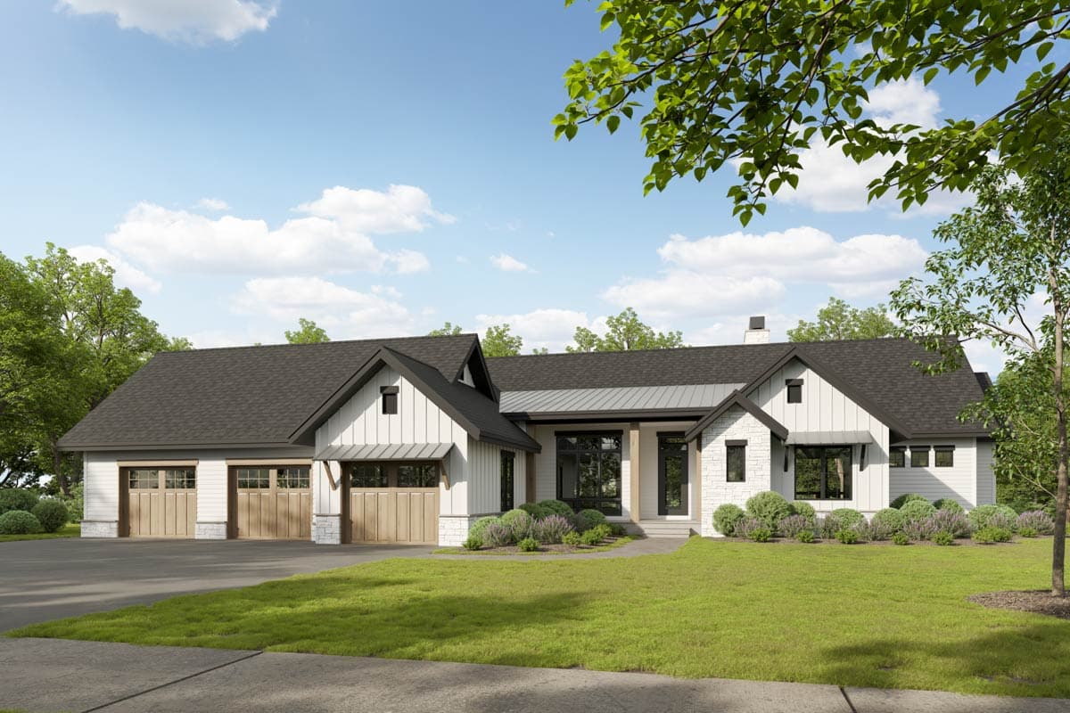 House plan exterior. Modern Farmhouse style with two stories, gabled rooflines, a covered porch, and a three-car garage.