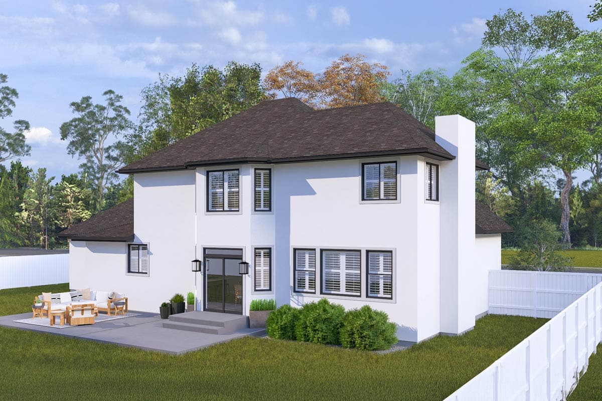 House plan exterior: Two-story stucco residence with a prominent chimney, dark-trimmed windows, and a covered patio area.