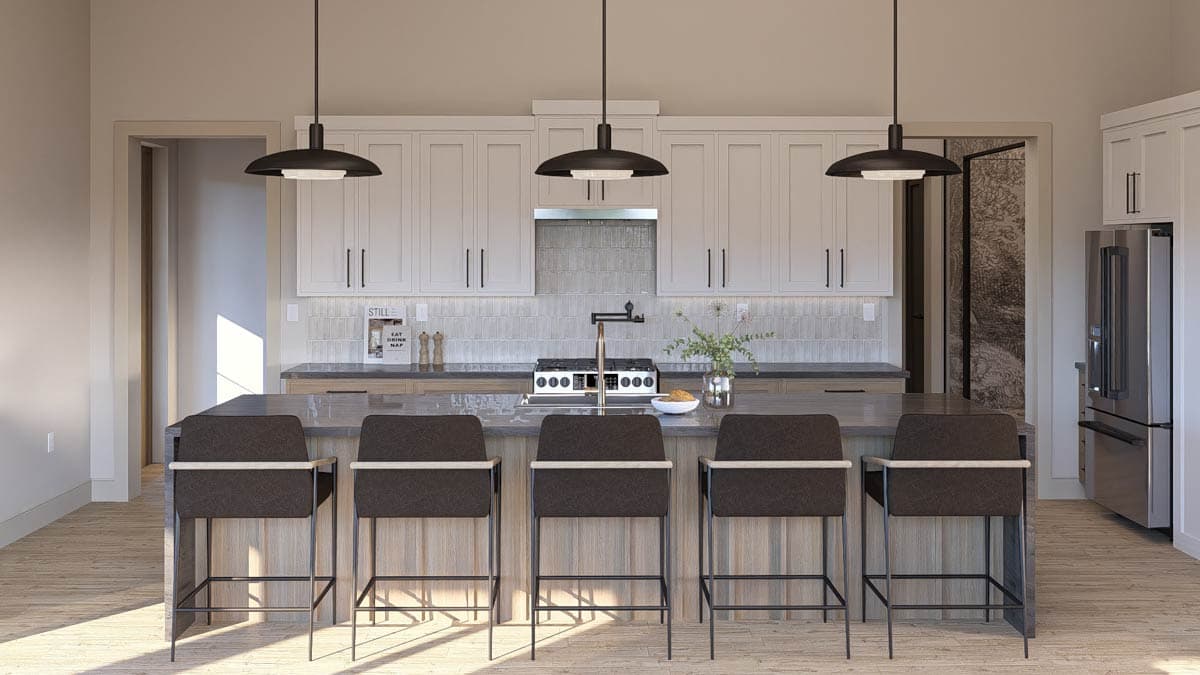 Modern kitchen with gray island, white cabinetry, gas range, and four counter stools.