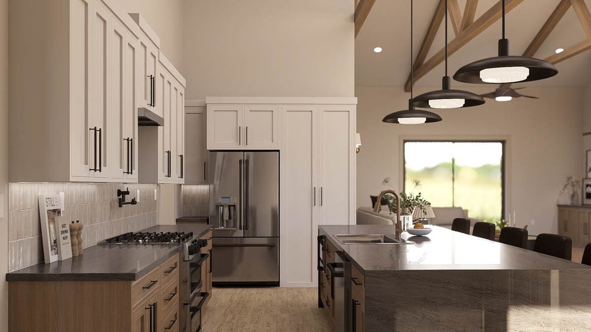 Kitchen and great room with vaulted ceiling, exposed beams, large island with sink, and modern cabinetry.