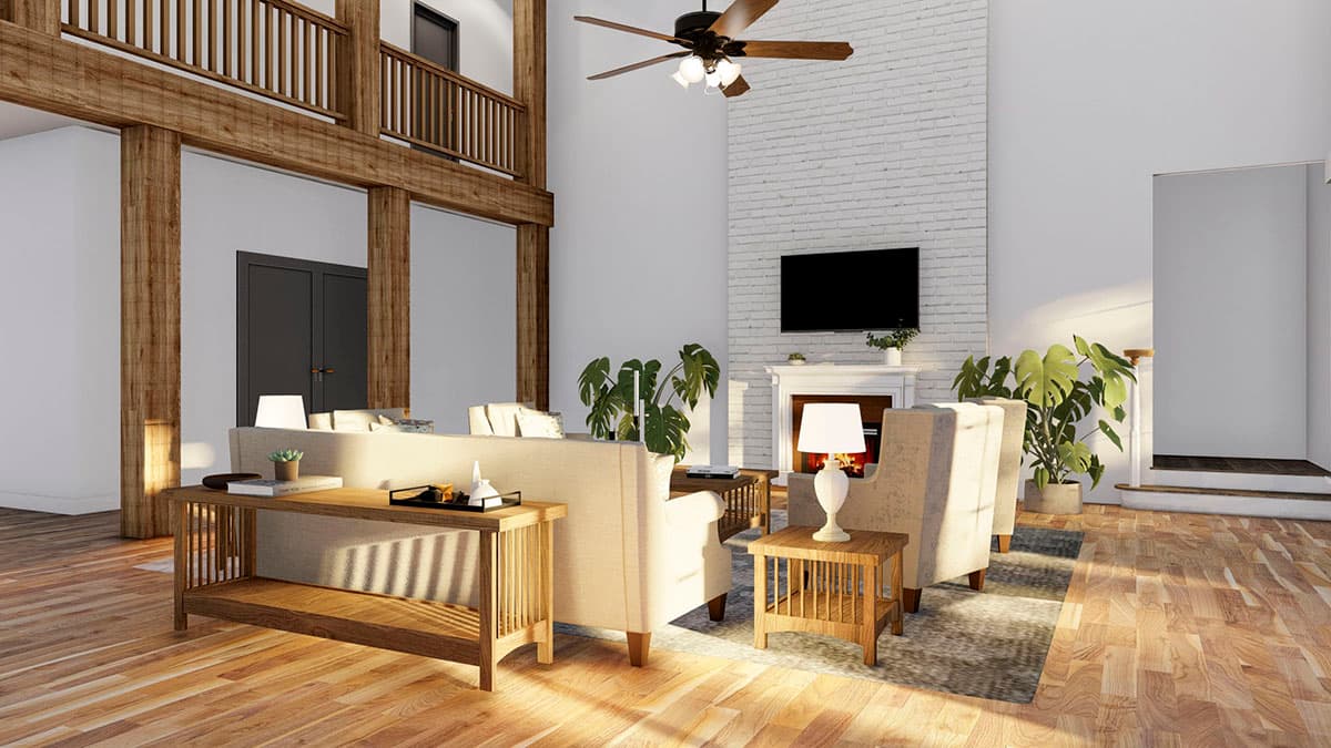 Great room with vaulted ceiling, exposed wood beams, fireplace, and lofted balcony overlook.