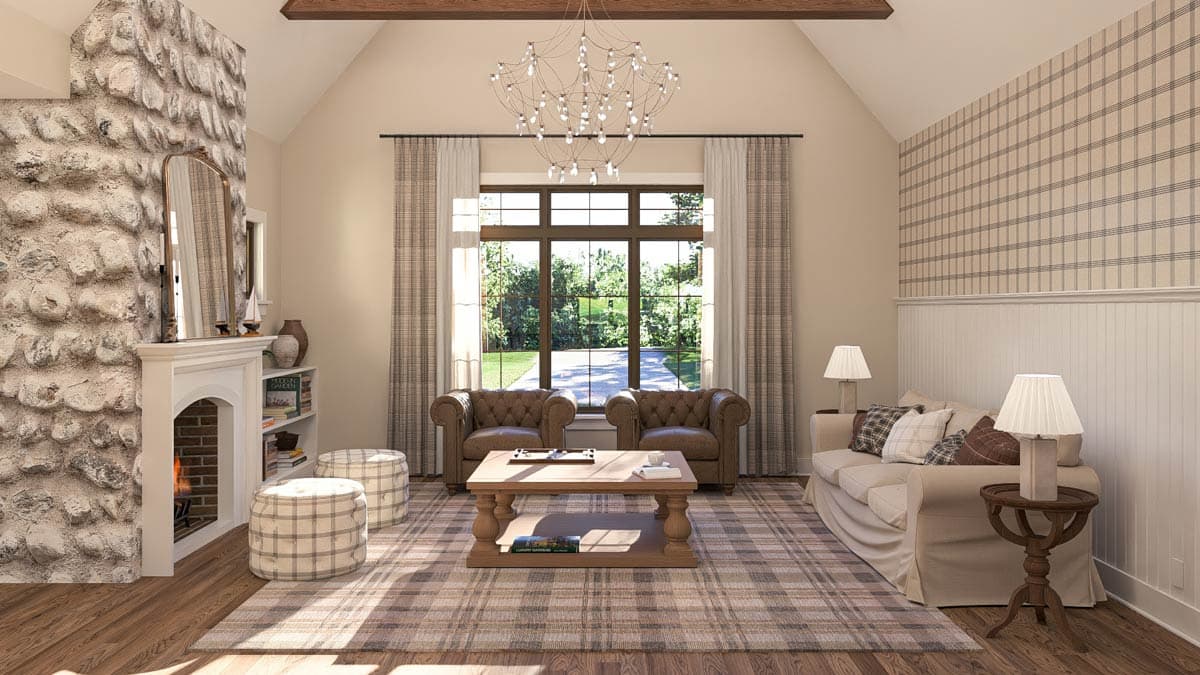 Great room with vaulted ceiling, stone fireplace, large window, and plaid accents.
