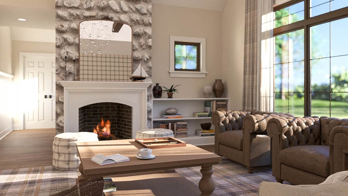 Living room with stone fireplace, tufted leather armchairs, wooden coffee table, and large window.