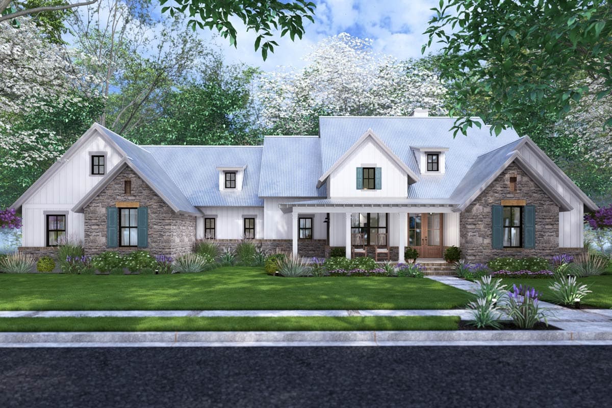 Modern Farmhouse house plan exterior with stone accents, metal roof, gables, dormers, and covered front porch.
