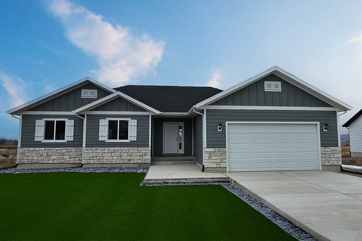 House plan exterior. Ranch style with a two-car garage, multiple gables, and stone veneer accents. Features white trim and shutters.