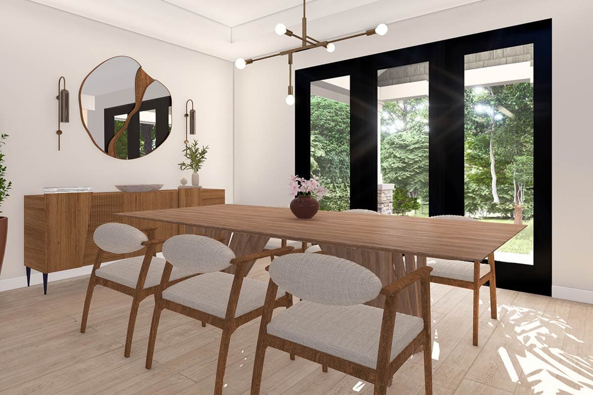 Dining room with wood table, chairs, credenza, abstract mirror, modern light fixture, and large glass doors.