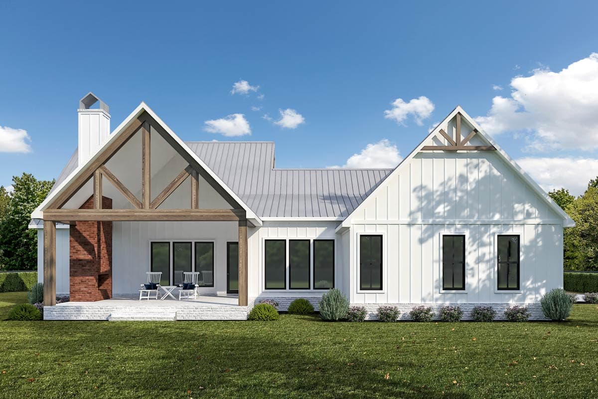 Modern Farmhouse house plan exterior with large gable, exposed beams, covered porch, and metal roof.