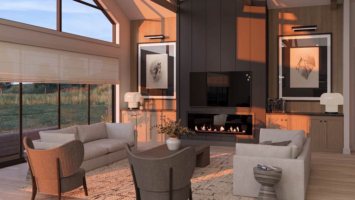 Living room with vaulted ceiling, fireplace, large windows, and built-in cabinetry.