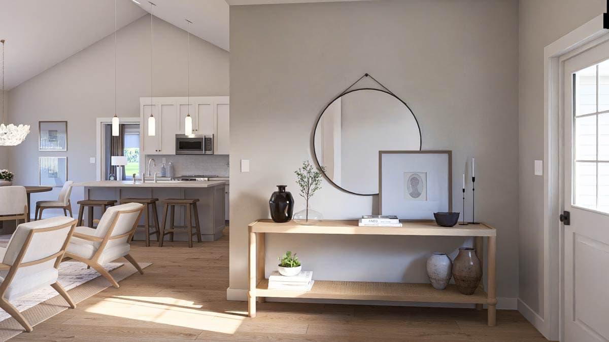 Interior rendering showing an open layout with a kitchen island, vaulted ceiling, and entryway console table.