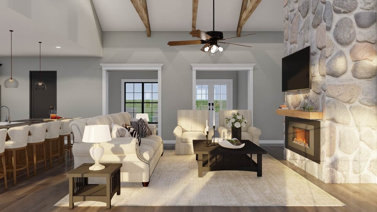 Interior rendering of a living room with vaulted ceilings, exposed beams, stone fireplace, TV, and island bar.