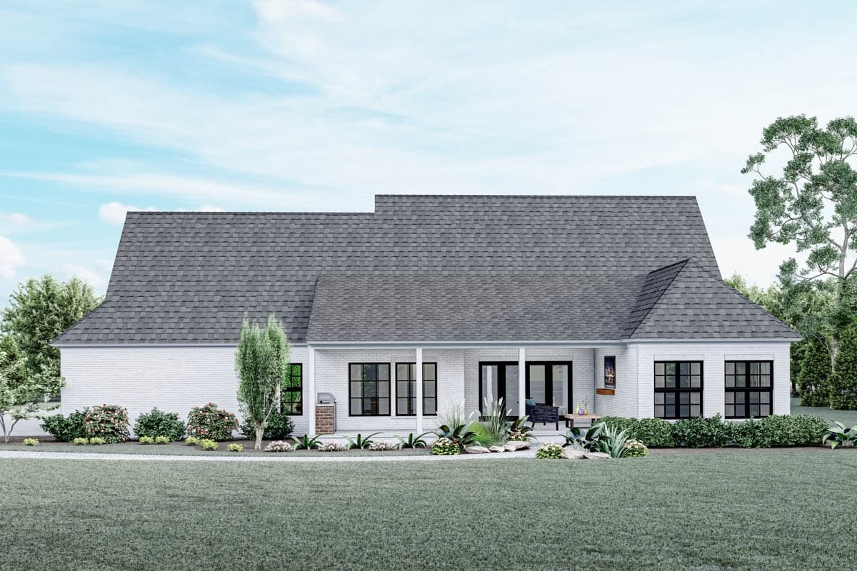 Modern farmhouse house plan exterior with white brick, covered porch, gable roof, and black-framed windows.