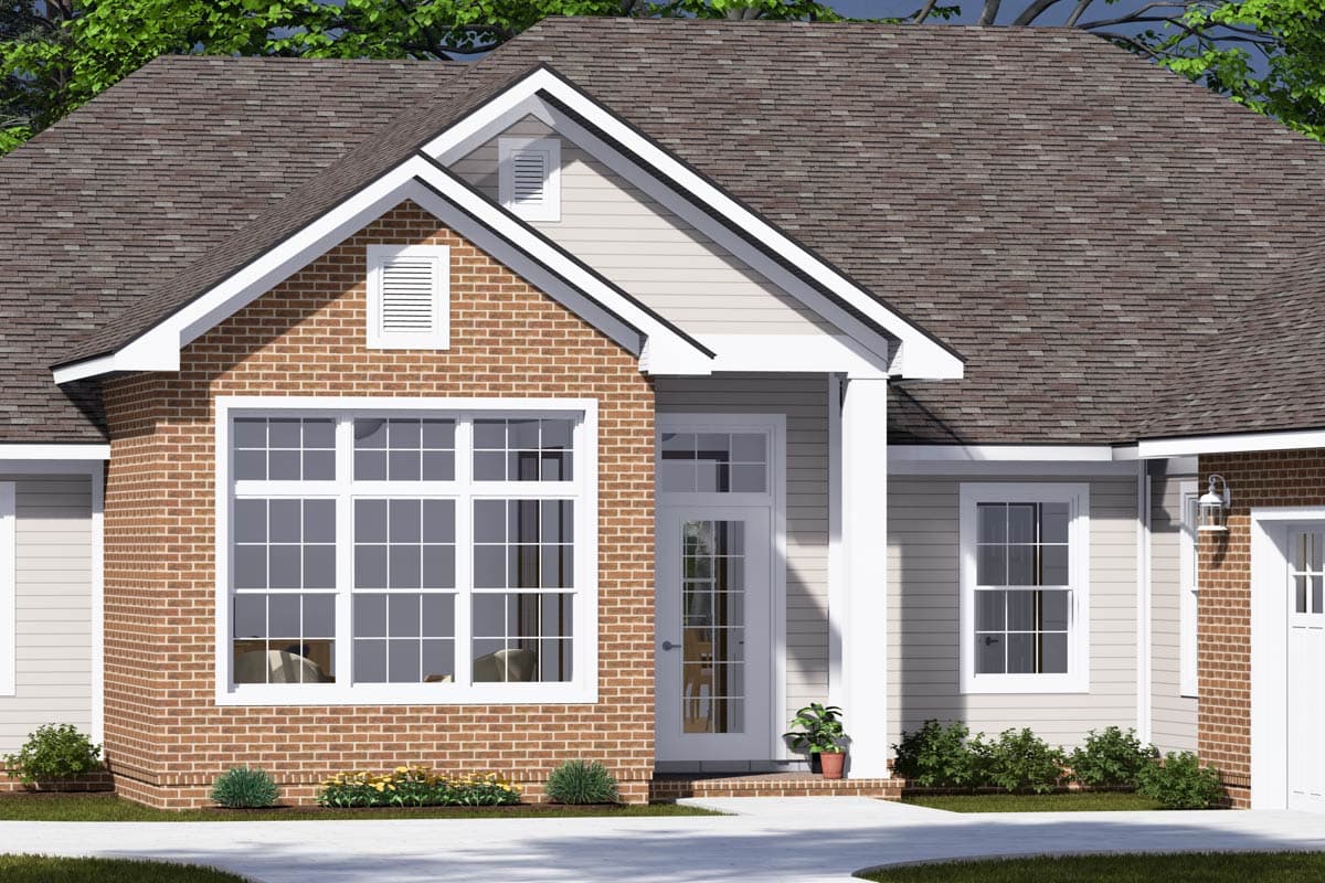 House plan exterior with brick and siding, prominent gables, large multi-pane windows, and covered entry.