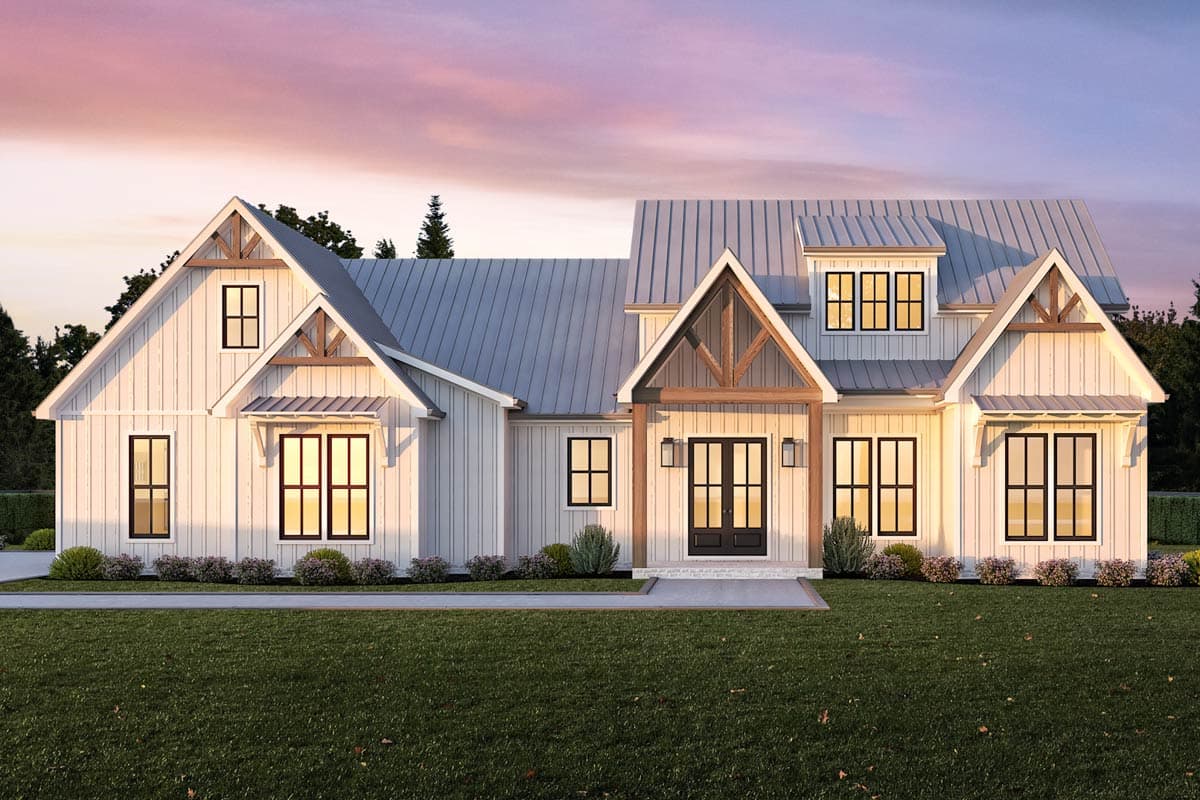 House plan exterior. Modern Farmhouse style, one-story. Features include gables, a metal roof, dormers, and a covered porch with exposed beams.