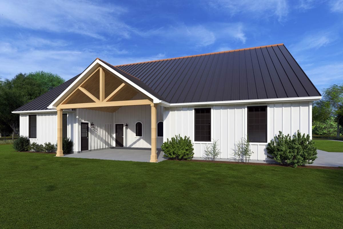 Modern Farmhouse house plan exterior with white board and batten siding, metal roof, and exposed rafter gable porch.