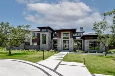 Two-Story Modern House Plan with Game Room Above - 4728 Sq Ft