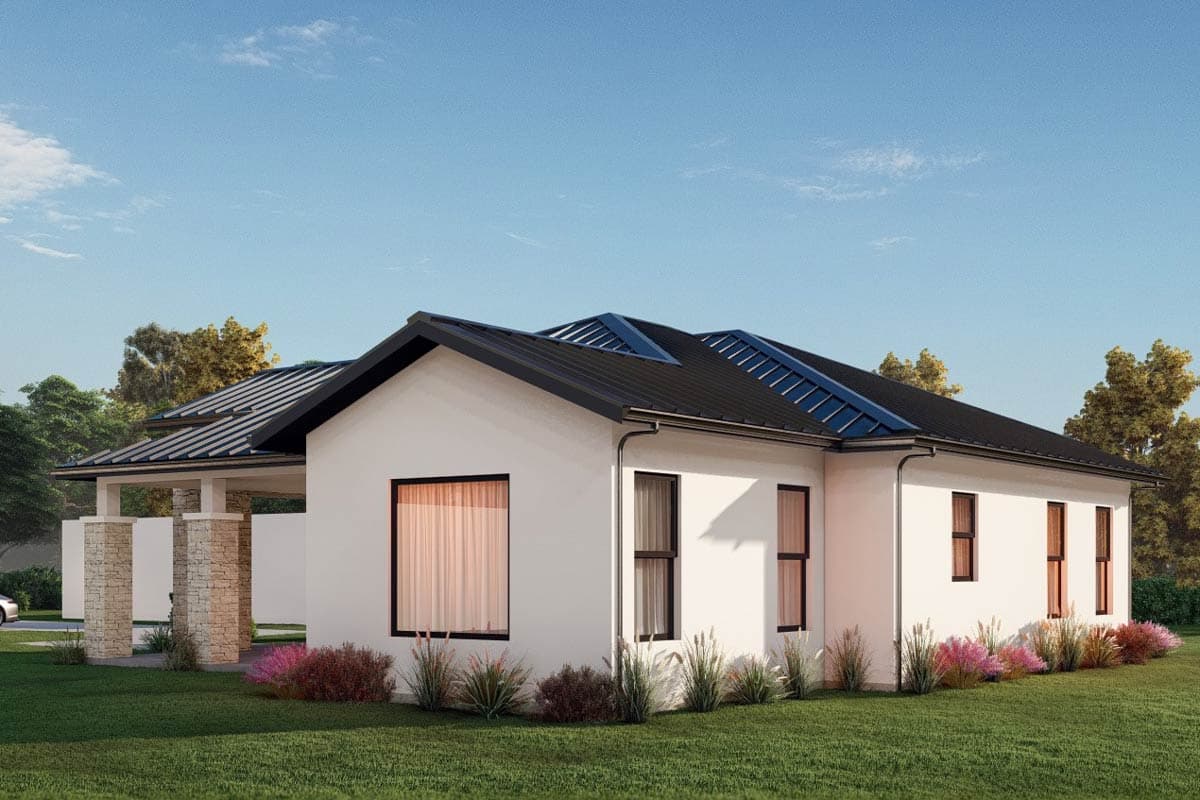 Ranch house plan exterior with a metal roof, stone column portico, and multiple gables.