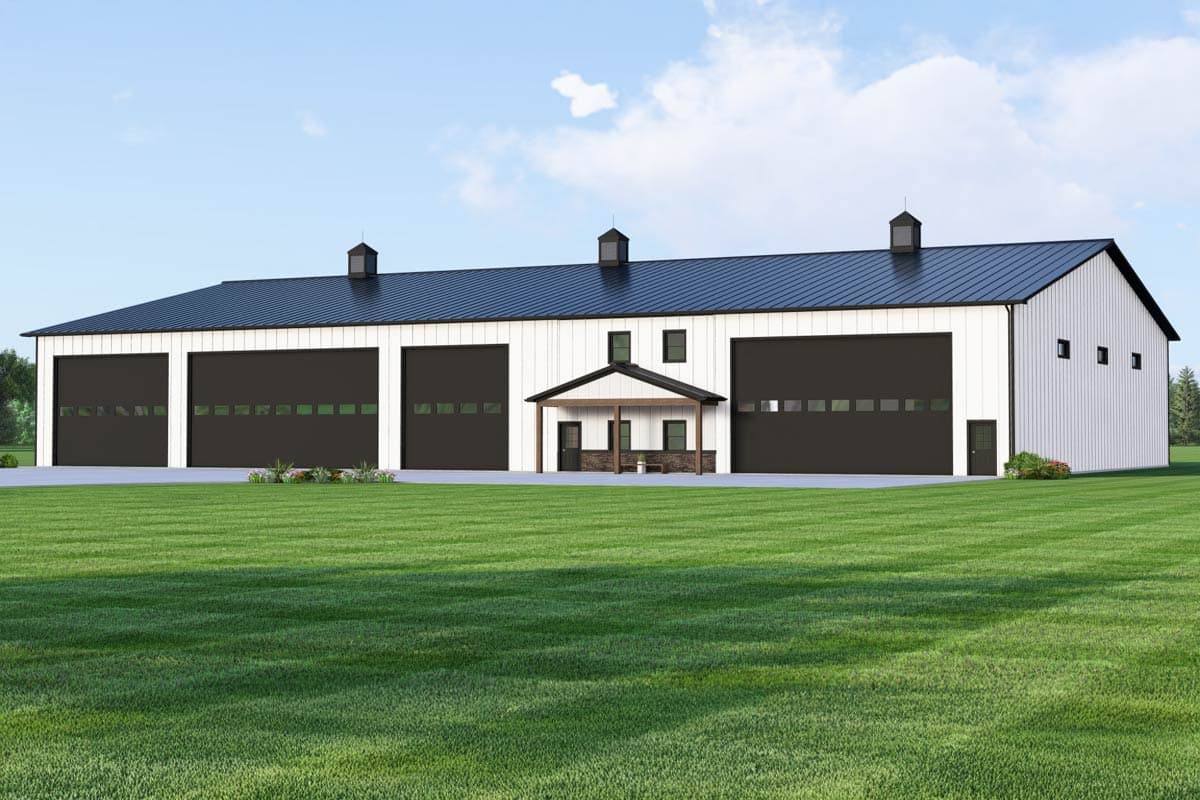 House plan exterior with a barn style, featuring a black metal roof, multiple garage doors, cupolas, and a small porch.