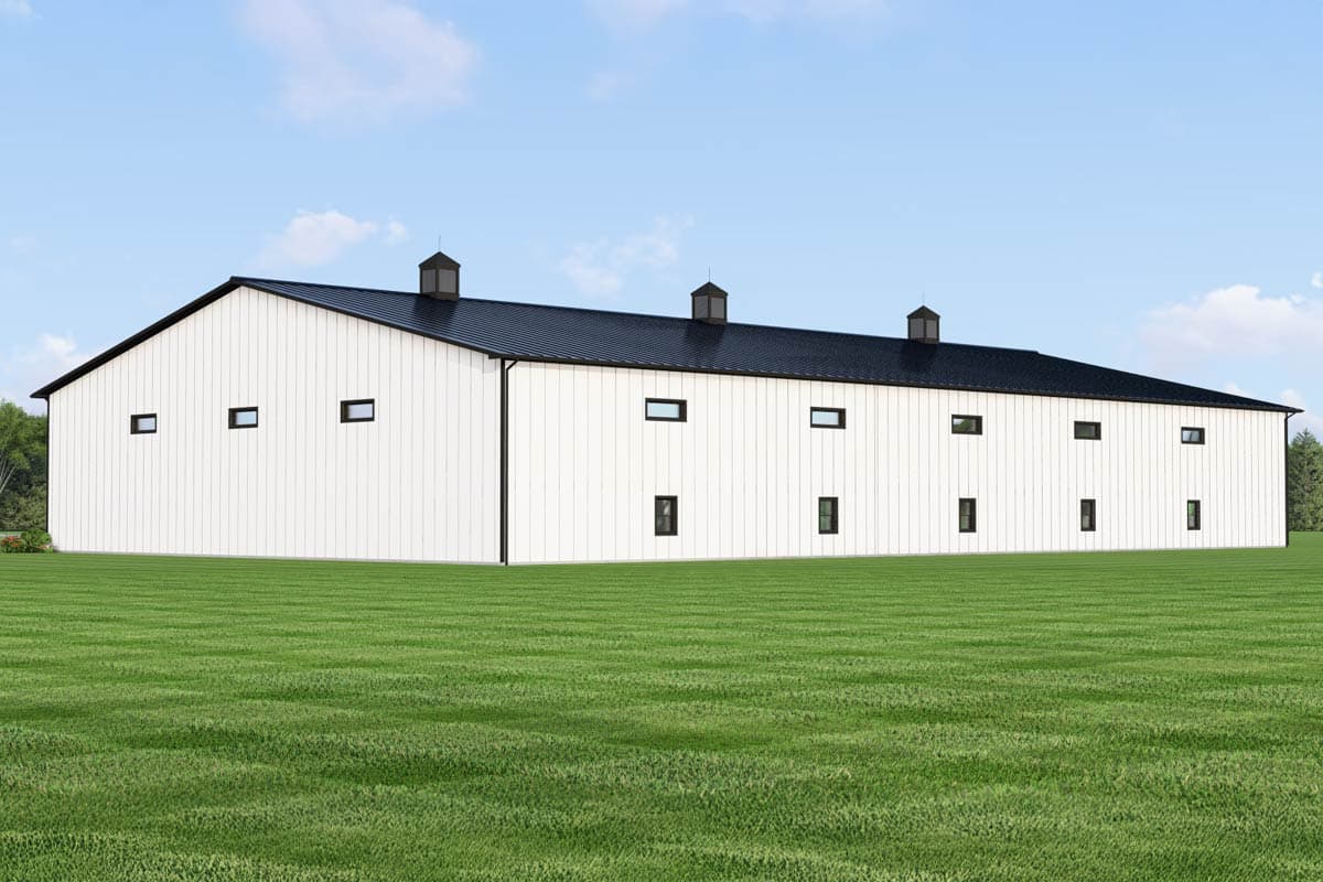 House plan exterior of a large, white, metal-sided barn with a black metal roof, multiple dormers, and numerous rectangular windows.