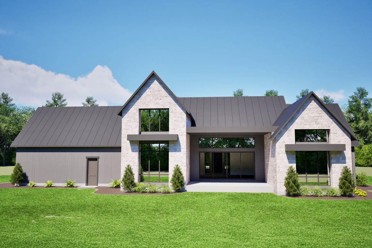 Modern house plan exterior with stone facade, metal roof, large windows, and attached garage. Two stories visible.