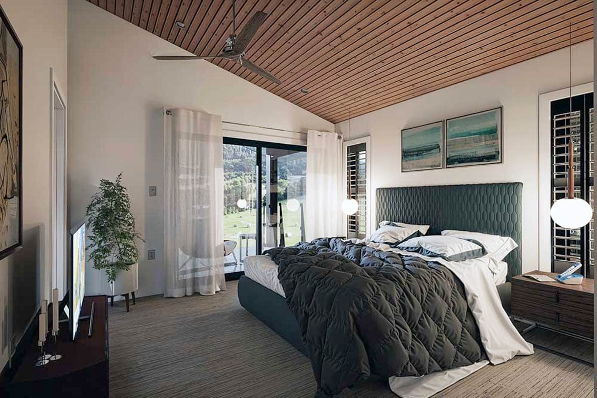 Bedroom with vaulted wood-paneled ceiling, king bed, large sliding glass doors, and minimalist decor.