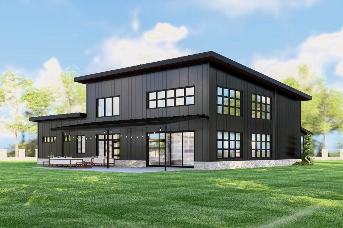 Modern two-story house plan with dark vertical siding, large grid windows, and covered patio with outdoor seating.