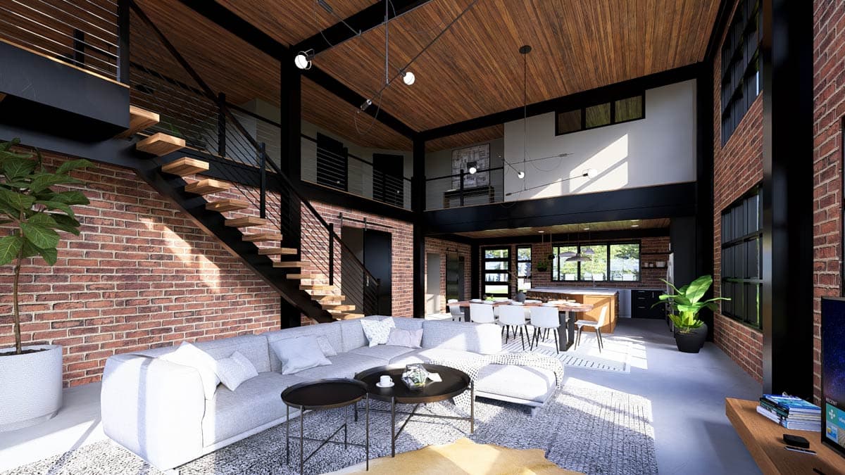 Open concept living space with vaulted wood ceiling, exposed brick, steel beams, floating stairs, and view of kitchen.