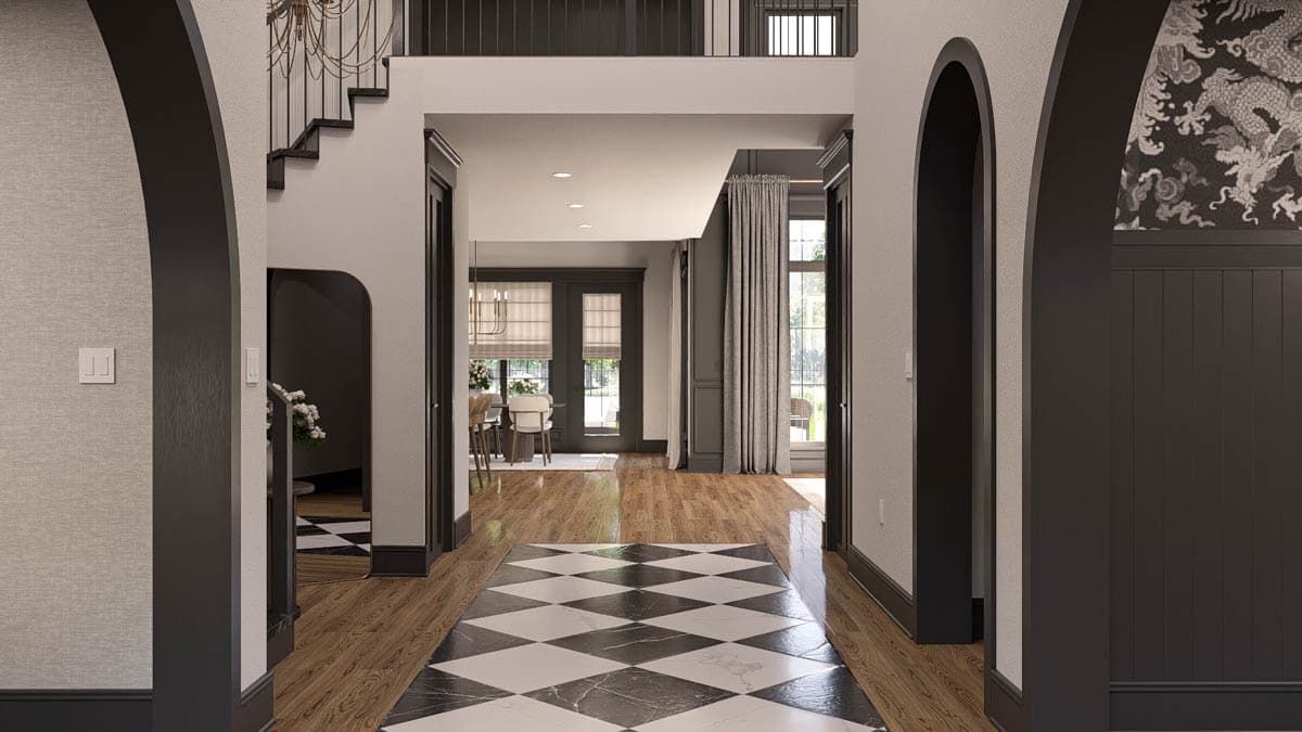 Interior view showing grand entryway with checkered marble floor, wood floors, staircase, and archways.
