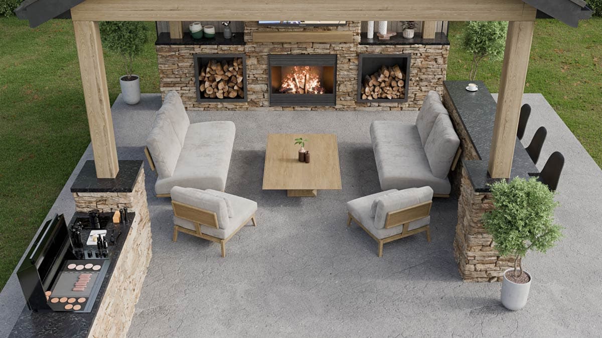 Outdoor living space with stone fireplace, bar, grill, and seating under a wooden pergola.