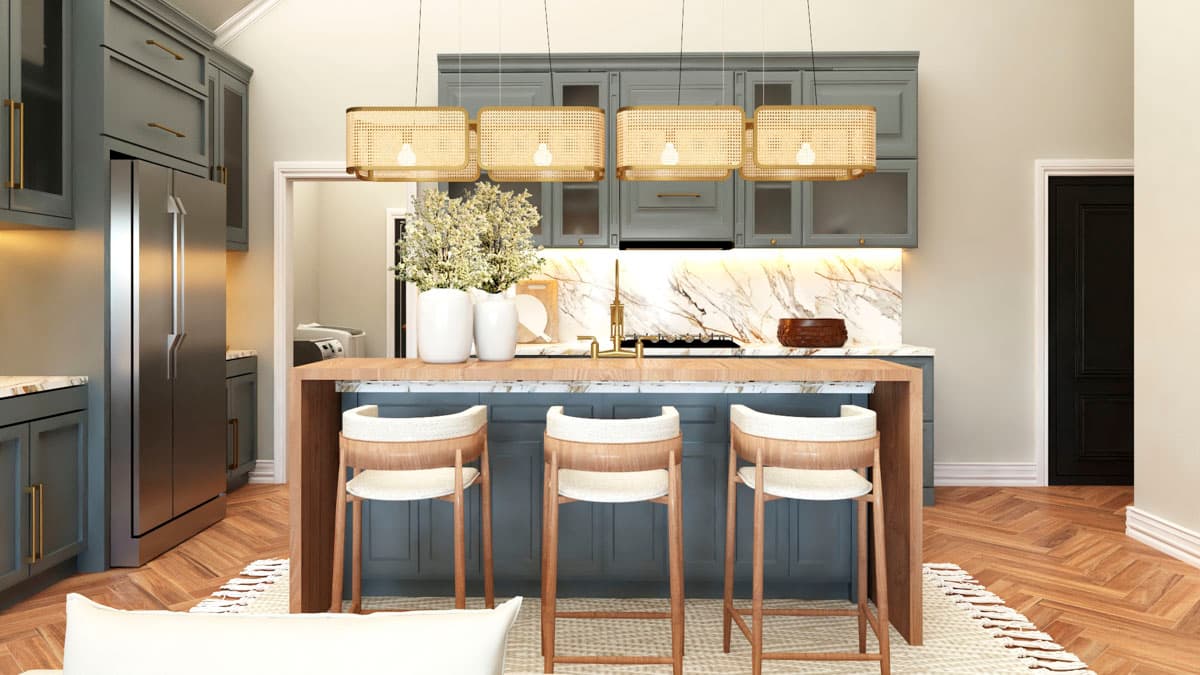 Kitchen with gray cabinets, stainless steel refrigerator, island with pendant lights, and marble backsplash.