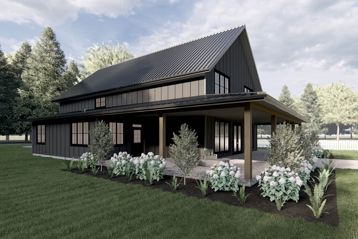Modern Farmhouse house plan exterior with a dark metal roof, wide covered porch, and large windows.