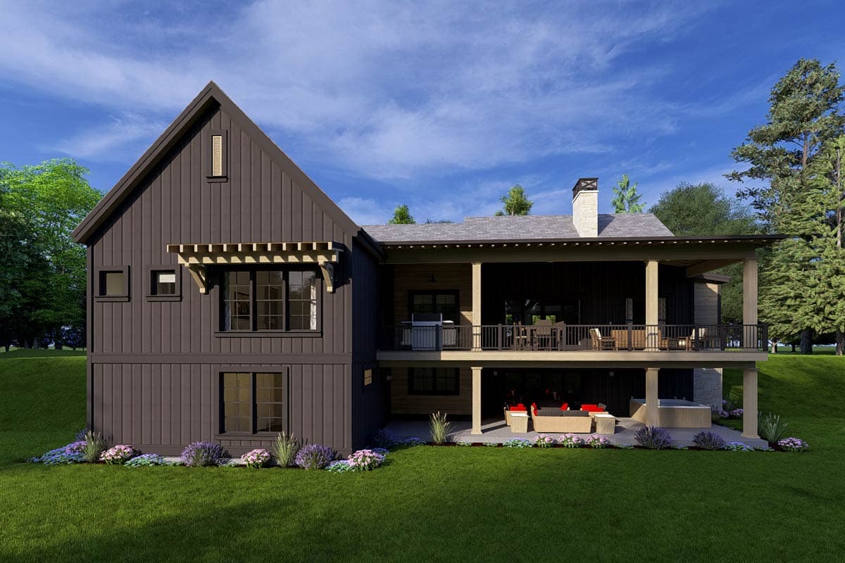 Modern Farmhouse house plan exterior with board and batten siding, large gables, a covered deck, and a lower patio with a hot tub.