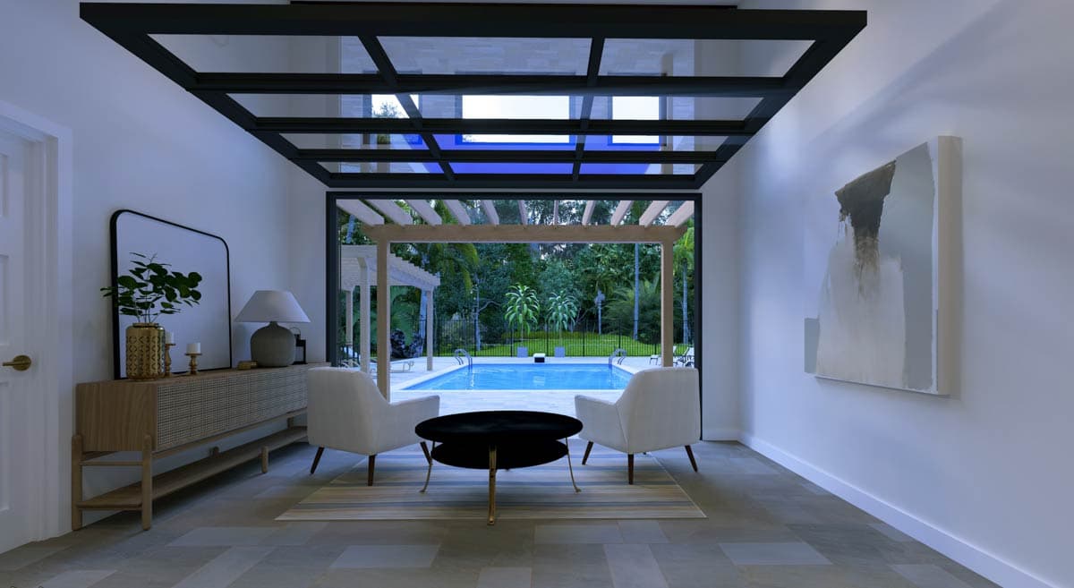Interior living space with vaulted ceiling and glass panels, opening to a backyard swimming pool and patio with pergolas.
