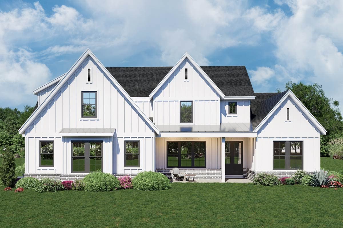 House plan exterior. Modern Farmhouse style with two stories, gabled rooflines, a front porch, and vertical siding.