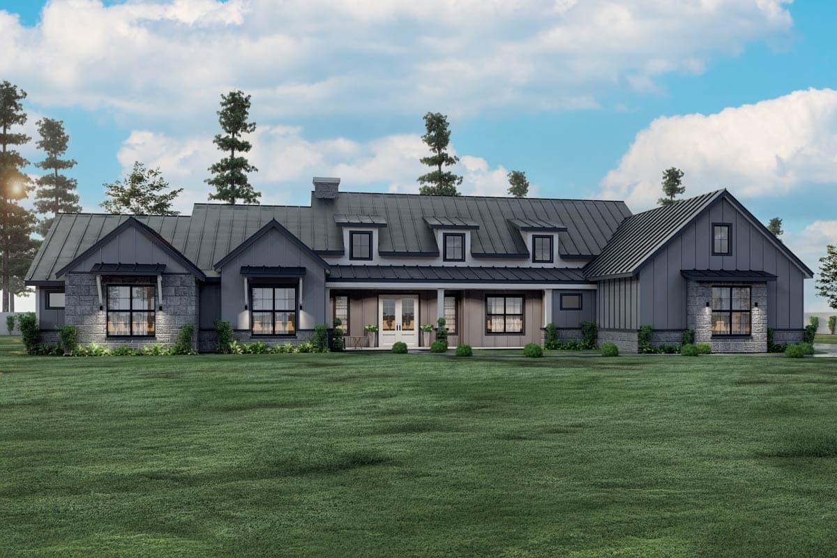 House plan exterior. Modern Farmhouse style with a single story, metal roof, gables, dormers, and a covered porch.