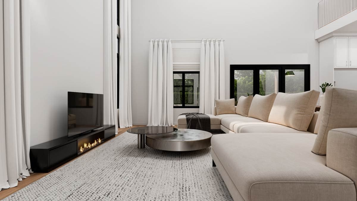 Great room with vaulted ceiling, linear fireplace, sectional sofa, and large windows.