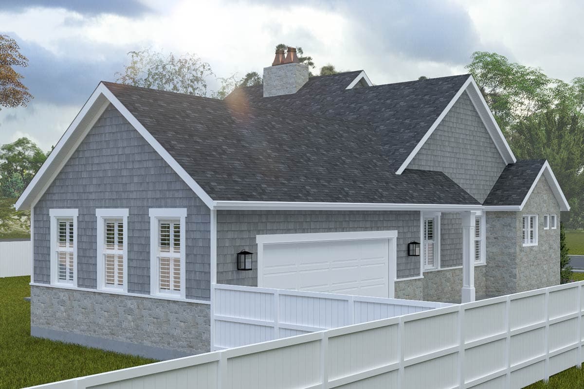 House plan exterior features stone and shingle siding, a gabled roof, a two-car garage, and a white picket fence.